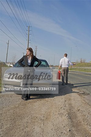 Man With Car Trouble, Man Hitchhiking With Jerry Can