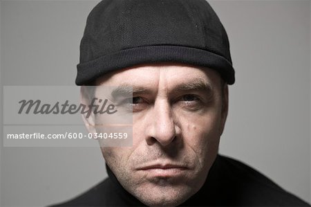 Portrait of Man in Black Cap