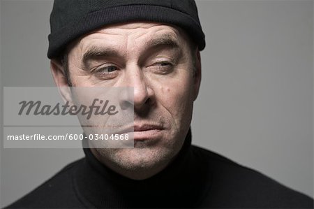 Portrait of Man in Black Cap