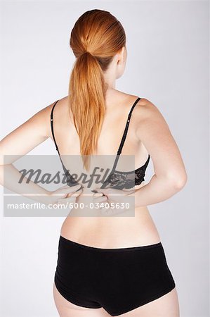 Woman Fastening Bra