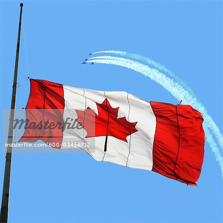 Canadian Flag at Half Mast, Snowbirds in the Background - Stock Photo -  Masterfile - Premium Royalty-Free, Artist: Andrew Kolb, Code: 600-03456712