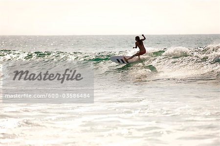 Woman Surfing, Baja California Sur, Mexico