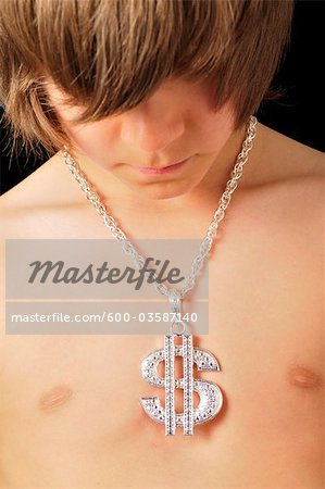 Boy Wearing Dollar Sign Necklace