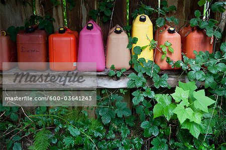 Empty Gas Containers on Shelf