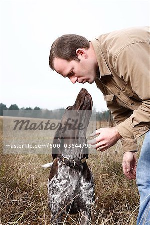 Dog Giving Owner a Kiss, Houston, Texas, USA