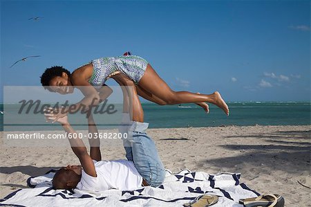 Couple Playing on the Beach, Florida, USA