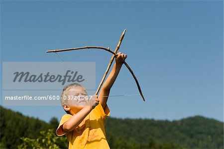 Boy Shooting Arrow, Salzburg, Salzburger Land, Austria