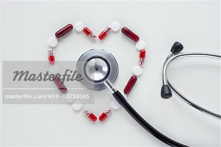 https://image1.masterfile.com/getImage/600-03738145em-pills-in-heart-shape-with-stethoscope-stock-photo.jpg