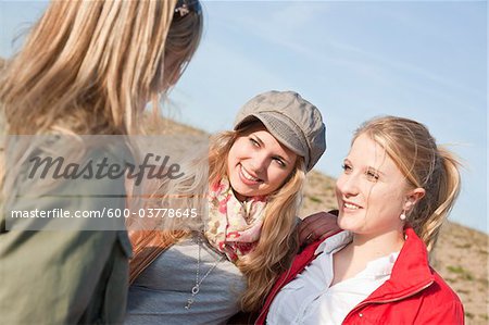Teenagers Talking Outdoors