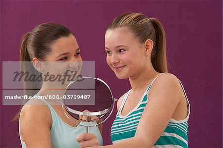 Girls Looking in Mirror