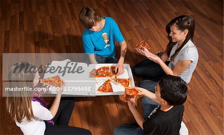 Children Eating Pizza