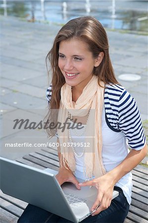 Young Woman Using Laptop Computer