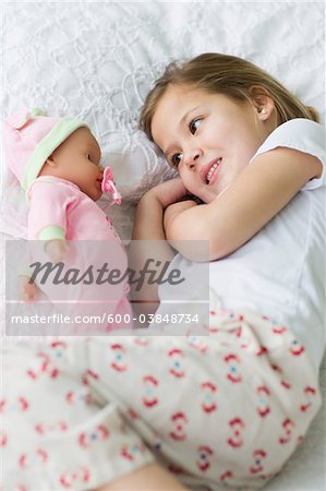 Girl Playing with Doll