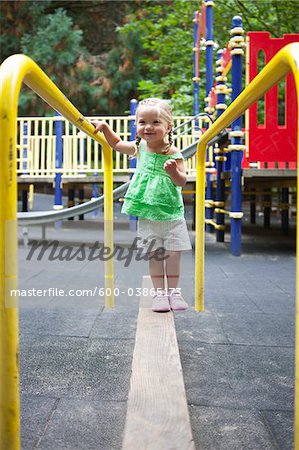 Girl Playing in Washington Park Playground, Portland, Oregon, USA