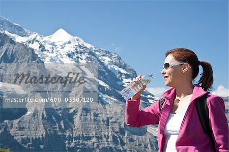 Woman Drinking Water, Bernese Oberland, Switzerland