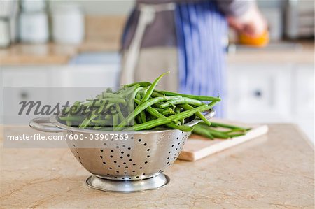 Man Cooking with Vegetables in Kitchen, Cape Town, Western Cape, South Africa