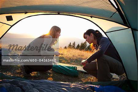 Women setting up Camp near Mt Hood, Oregon, USA