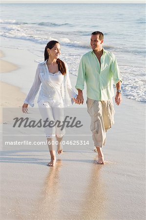 Couple Walking on Beach