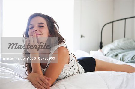 Woman Lying on Bed