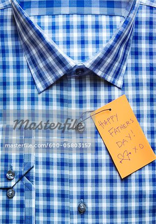 Close-up of Shirt with Happy Father's Day Tag Close-up of Shirt with Happy Father's Day Tag