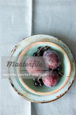 Plums and Black Currants in Bowl