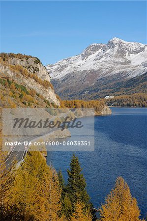 Road along Lake Sils in Autumn, Piz Surlej and Munt Arlas, St Moritz, Maloja District, Engadin, Graubunden, Switzerland