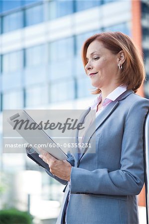 Businesswoman using Tablet PC, Niederrad, Frankfurt, Germany