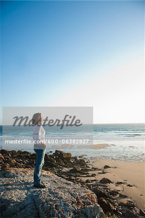 Woman Looking into the Distance at the Beach, Camaret-sur-Mer, Crozon Peninsula, Finistere, Brittany, France