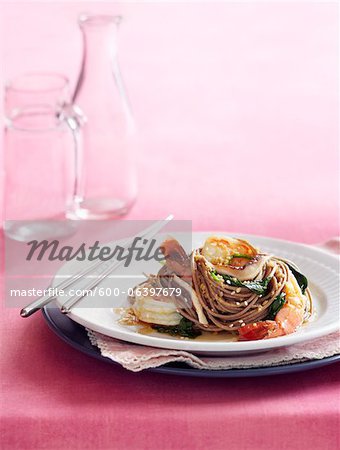 Soba Noodle Salad with Shrimp and Spinach on Plate with Chopsticks