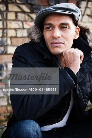 Portrait of Man Outdoors Wearing a Cap, Mannheim, Baden-Wurttemberg, Germany