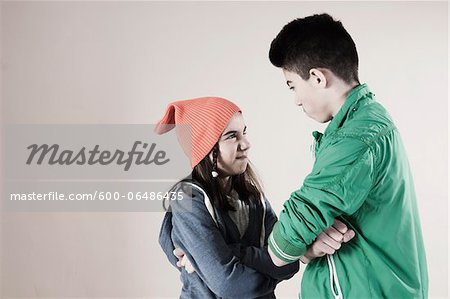 Girl and Boy Arguing in Studio Girl and Boy Arguing in Studio