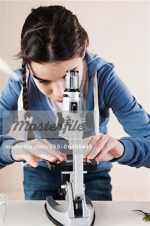 Girl using Microscope, Mannheim, Baden-Wurttemberg, Germany