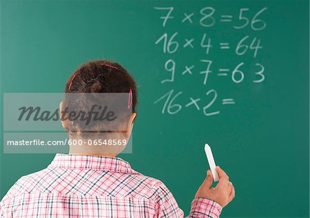 Girl Answering Question at Blackboard in Classroom, Baden-Wurttemberg, Germany