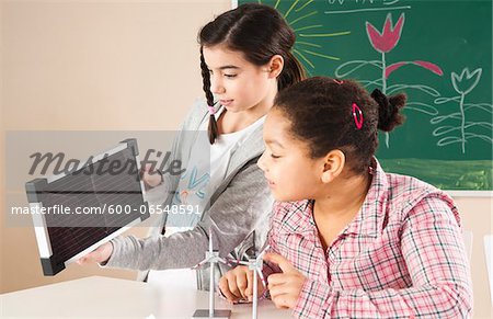 Girls Learning about Alternative Energy in Classroom, Baden-Wurttemberg, Germany
