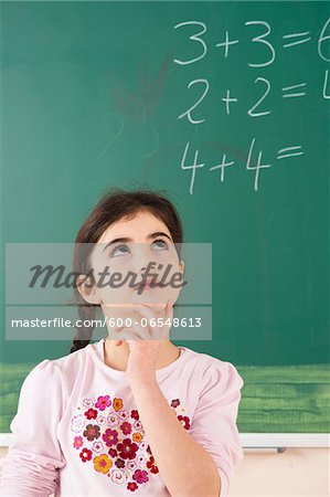 Girl Answering Question at Blackboard in Classroom, Baden-Wurttemberg, Germany