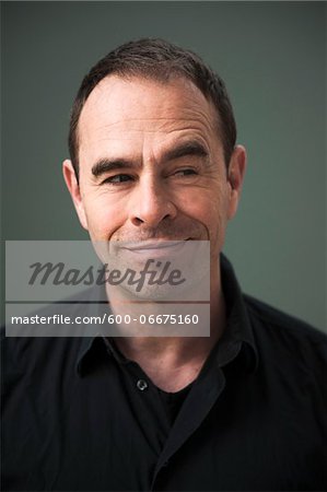 Head and Shoulders Portrait of Mature Man Looking to the Side