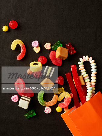 Assorted Candy Spilling out of Bag