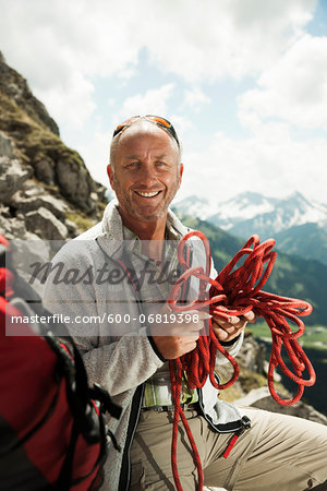 Portrait of Man Hiking in Mountains, Tannheimer Tal, Tyrol, Austria