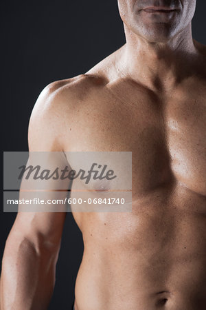 Close-up of Muscular Man's Chest, Studio Shot