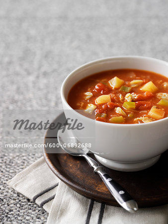 Bowl of Tomato Clam Chowder with Green Pepper and Potato, Studio Shot