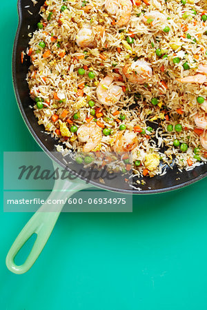 Overhead View of Shrimp Fried Rice in Skillet with Peas, Carrots and Egg, Studio Shot