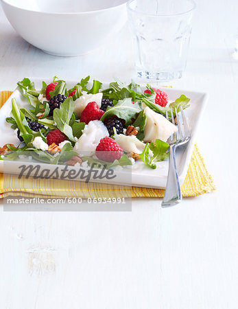 Fish Salad with Berries, Goat Cheese, Pecans and Arugula, Studio Shot Fish Salad with Berries, Goat Cheese, Pecans and Arugula, Studio Shot