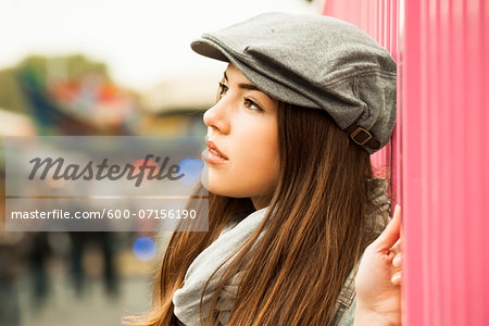 Close-up portrait of teenage girl wearing hat at amusement park, Germany