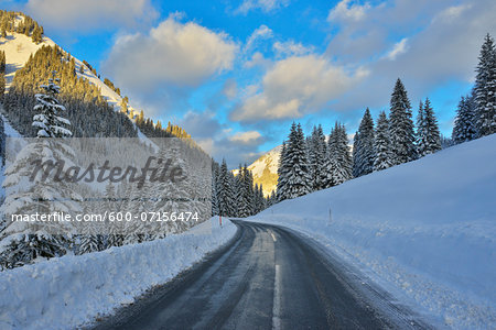 Road in Winter with Snow Covered Mountains, Berwang, Alps, Tyrol, Austria