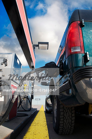 Close-up of truck being filled up at gas station, Trans Canada Highway, near Thunder Bay, Ontario, Canada