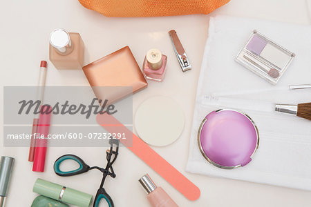 Overhead View of Bathroom Countertop with Women's Cosmetics and Beauty Products