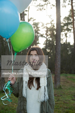 Young Woman with Balloons Outdoors, Mannheim, Baden-Wurttemberg, Germany