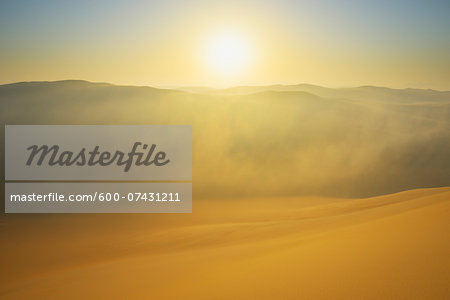 Golden Glow on Sand Dunes with Morning Mist, Matruh, Great Sand Sea, Libyan Desert, Sahara Desert, Egypt, North Africa, Africa Golden Glow on Sand Dunes with Morning Mist, Matruh, Great Sand Sea, Libyan Desert, Sahara Desert, Egypt, North Africa, Africa