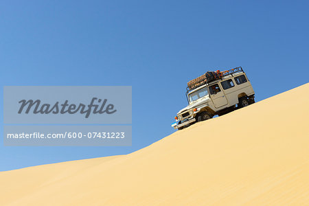 Four Wheel Drive Car in Desert, Matruh, Great Sand Sea, Libyan Desert, Sahara Desert, Egypt, North Africa, Africa Four Wheel Drive Car in Desert, Matruh, Great Sand Sea, Libyan Desert, Sahara Desert, Egypt, North Africa, Africa
