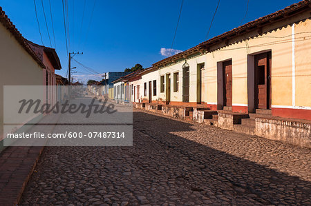 Buildings on cobblestone street, Trinidad, Cuba, West Indies, Caribbean